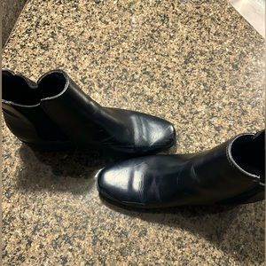 Gently worn. Black low heeled boots. Ladies sized 8 1/2.